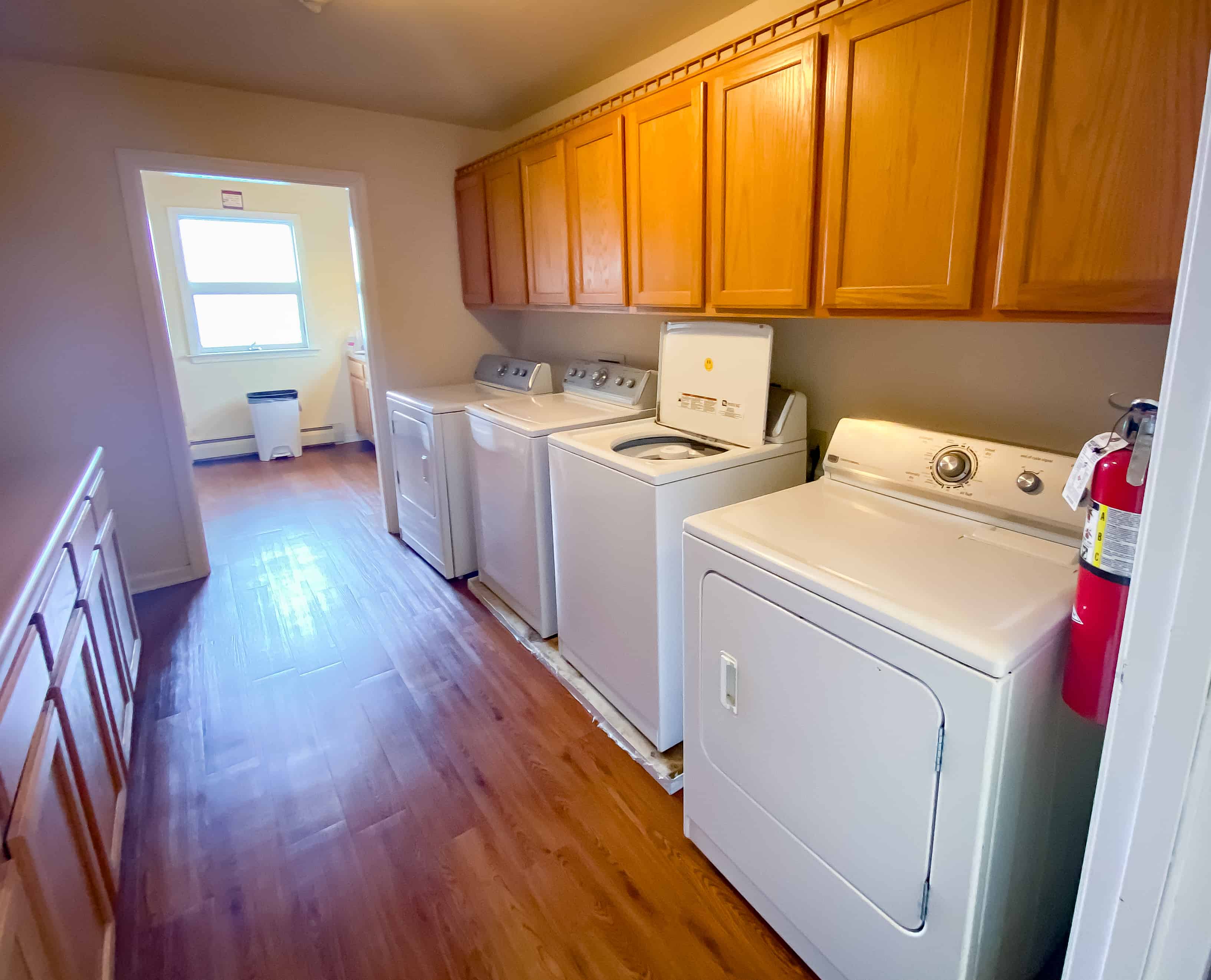 On-site laundry room with washers and dryers