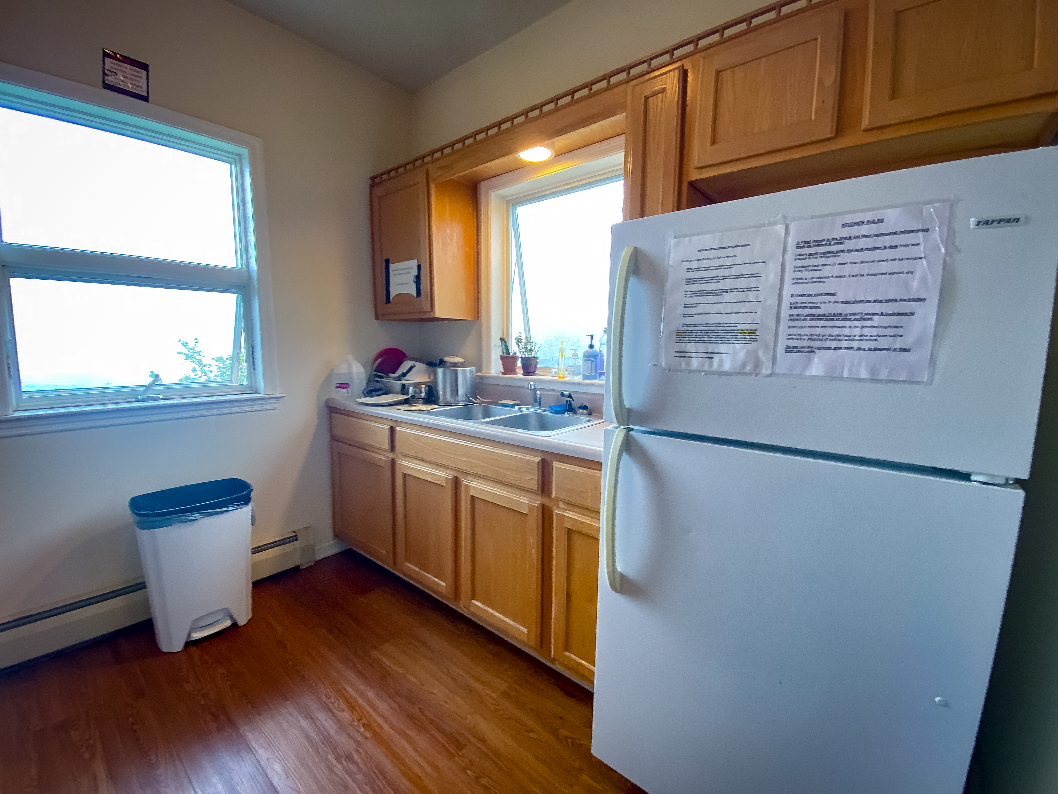 Studio kitchenette with full-size refrigerator and prep counter