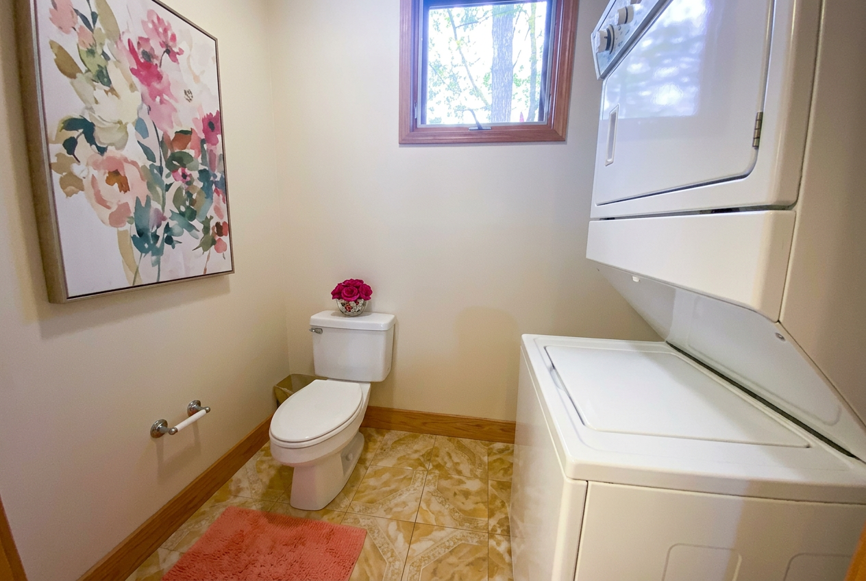 In-unit laundry alcove with washer and dryer