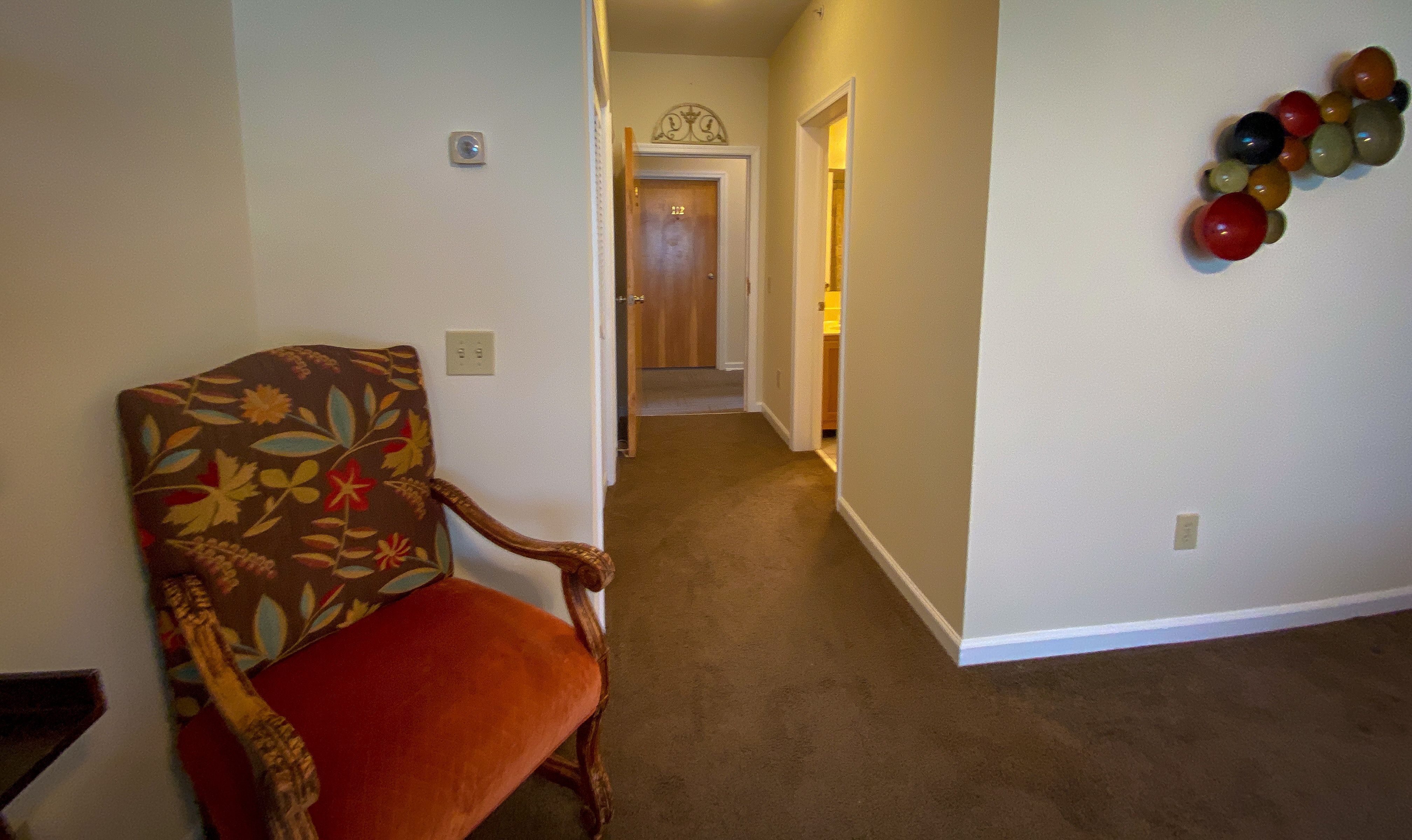 Entry hallway leading into the studio apartment